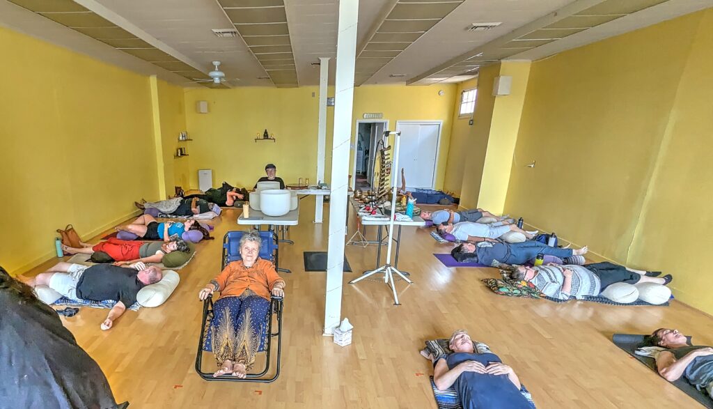 Participants resting during a sound bath in Vallejo.