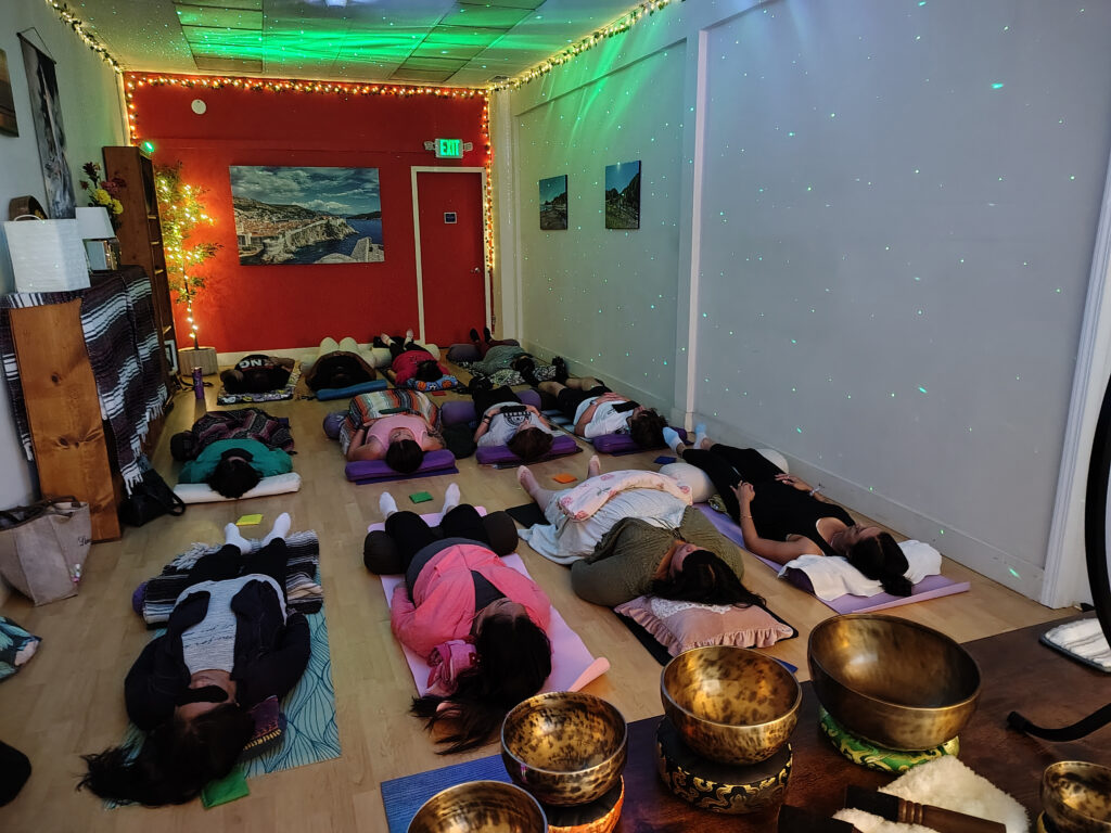 Participants resting during a sound bath in Vallejo